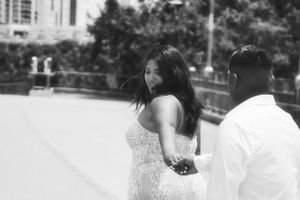 woman leading her man by the hand