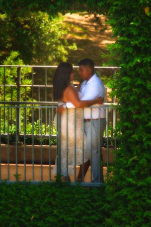engaged couple embracing one another