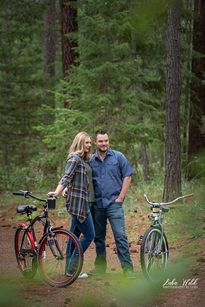 engagement forever photographer near me in Spokane and Coeur d'alene area, engaged couple with bicycles