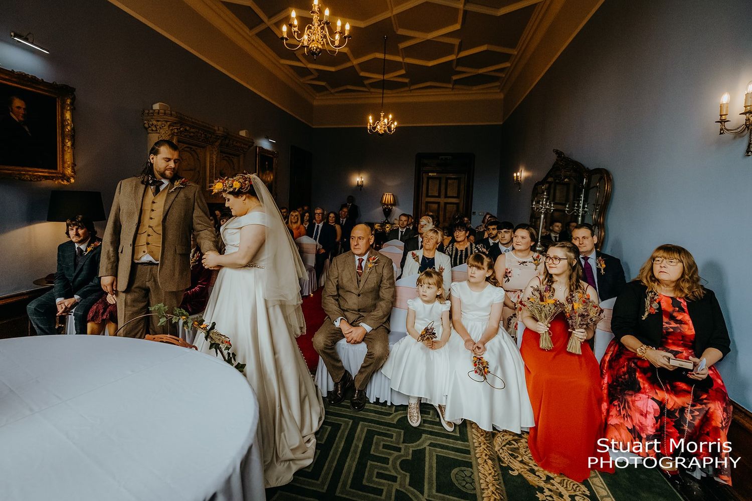 Bride and Groom exchange vows at Ruthin castle. north Wales wedding photographer. Stuart Morris Photography.
