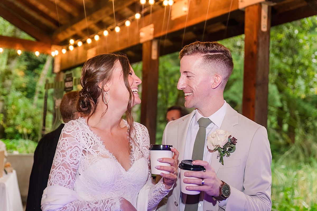 Bride and groom enjoy coffee during wedding reception