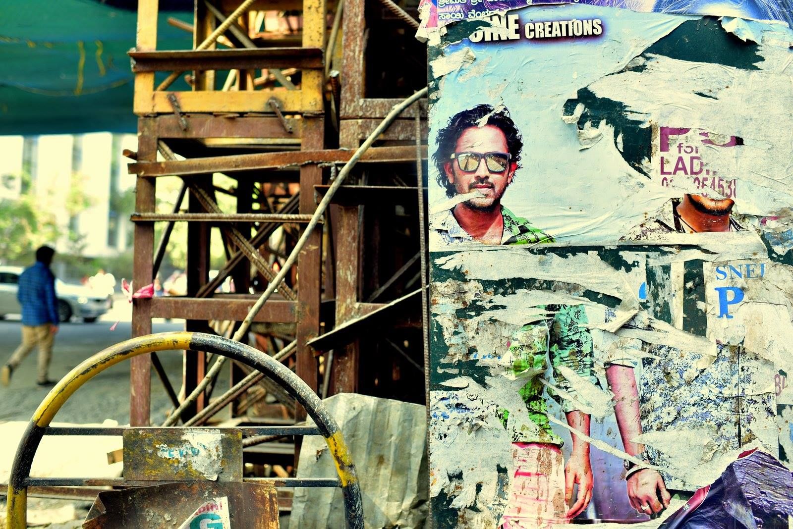 Faded street advertisements in Bangalore, India