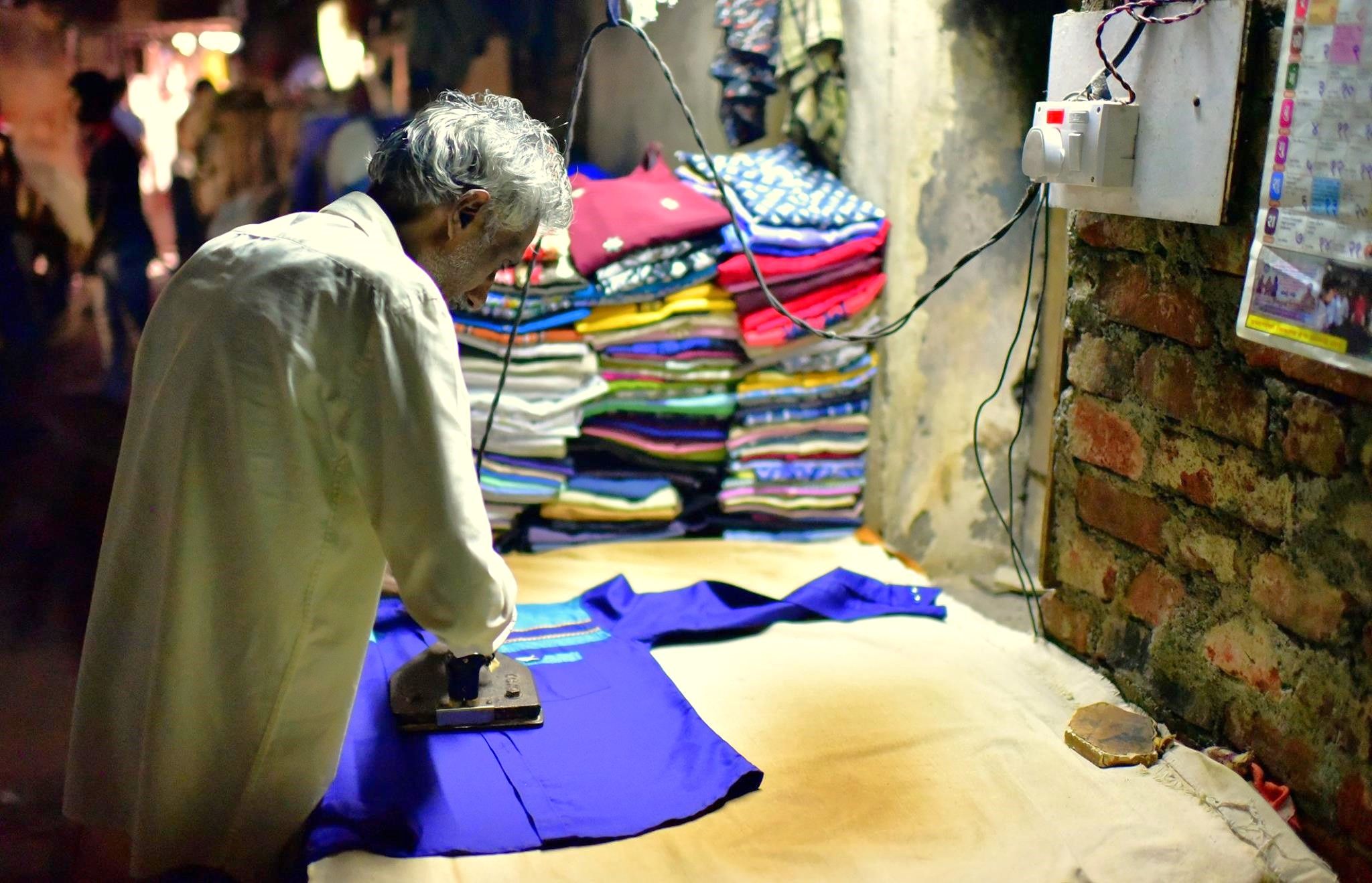 A worker in Dhobi Ghat open air laundry in Mumbai, India.