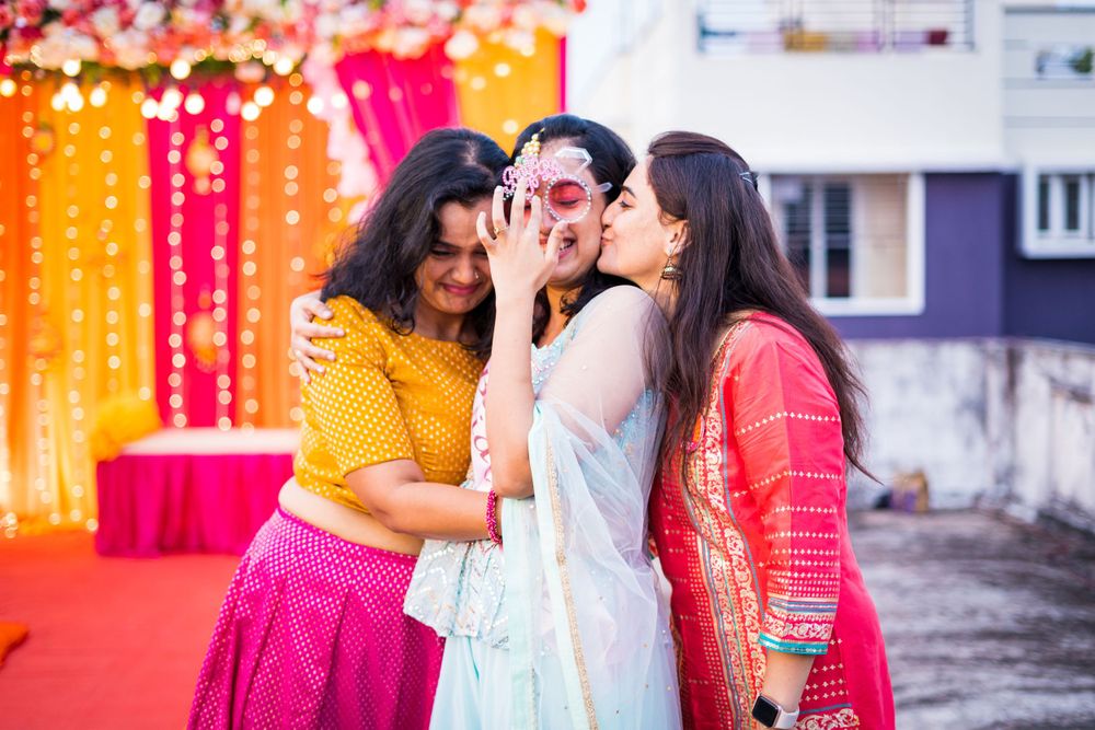 Festive celebration scene with bright orange and pink decoration elements.