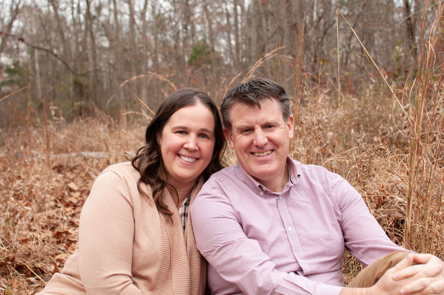 Couple sitting together in fall colors