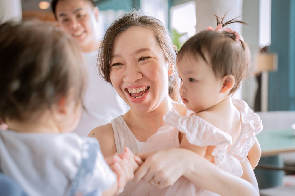 A joyful gathering with bright natural lighting and warm expressions.