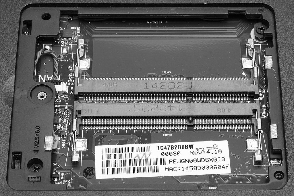 Typical laptop memory module housing and ZIF sockets (B+W)