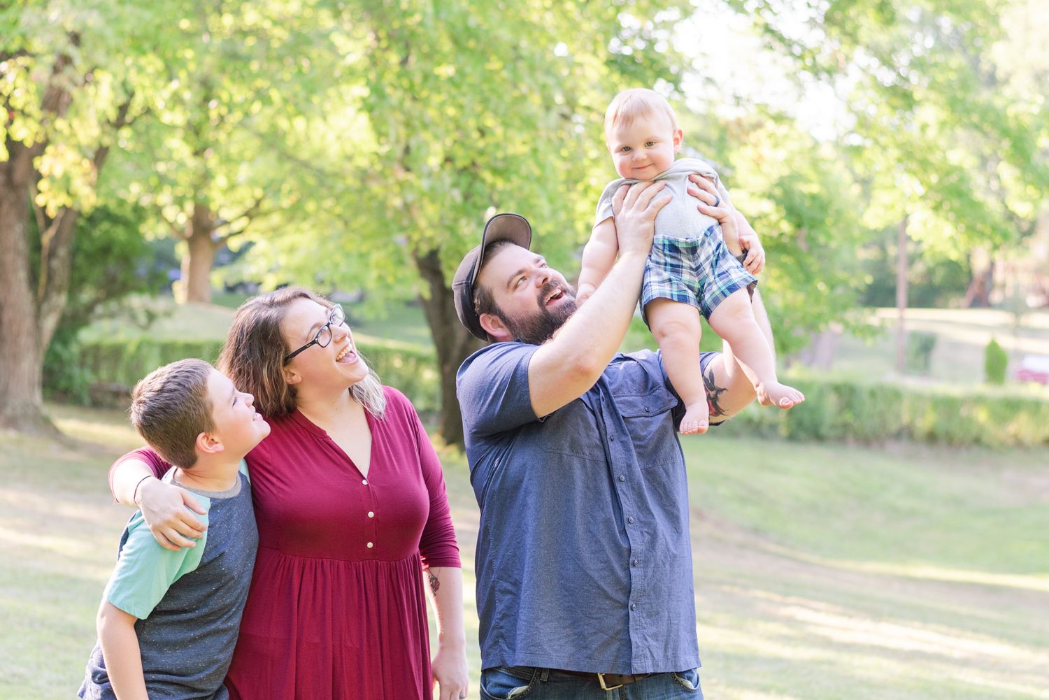 Family holding baby up in Mars, Pennsylvania