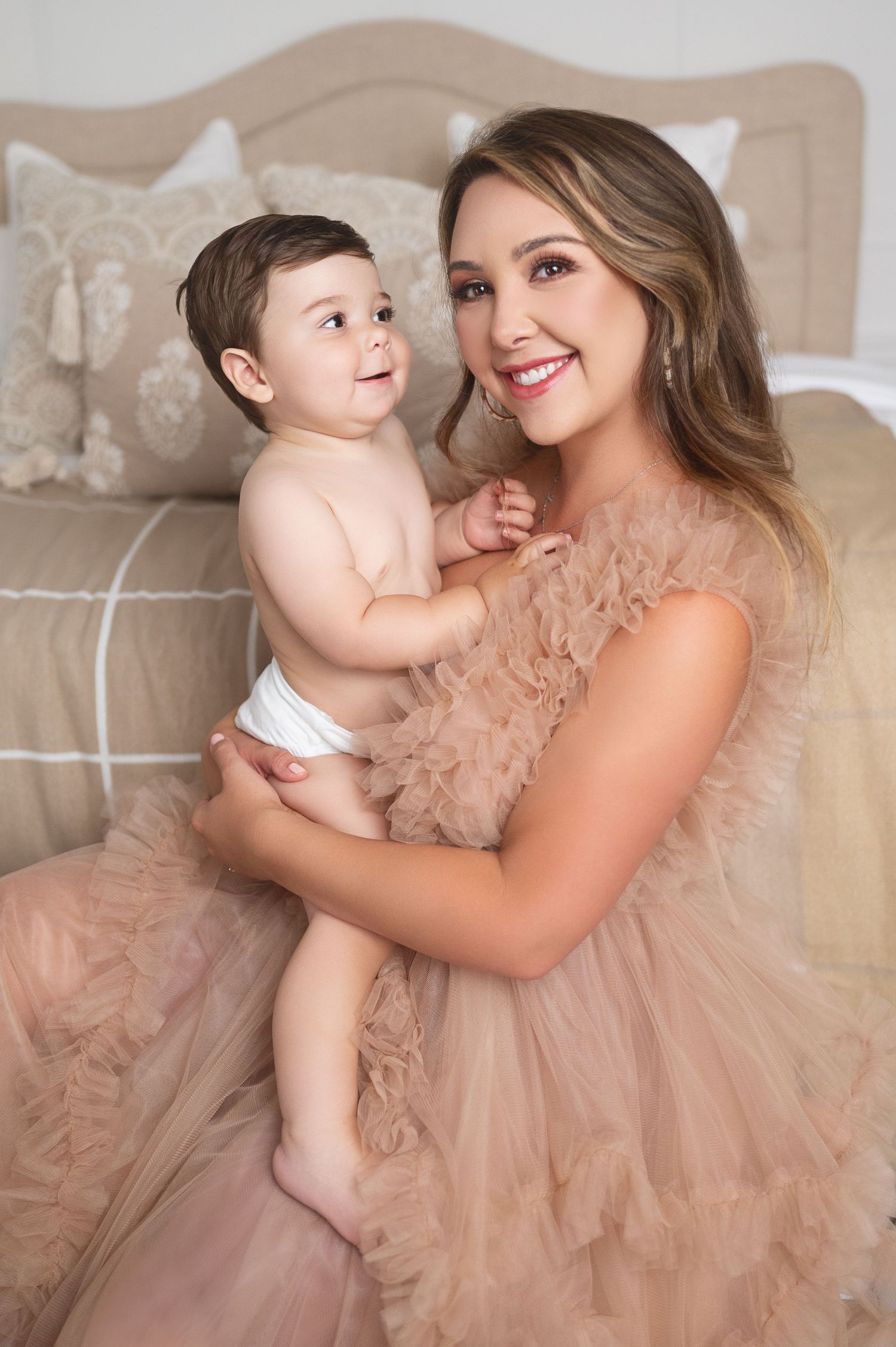 Sweet family photo session featuring blush tulle dress and coordinated outfits.