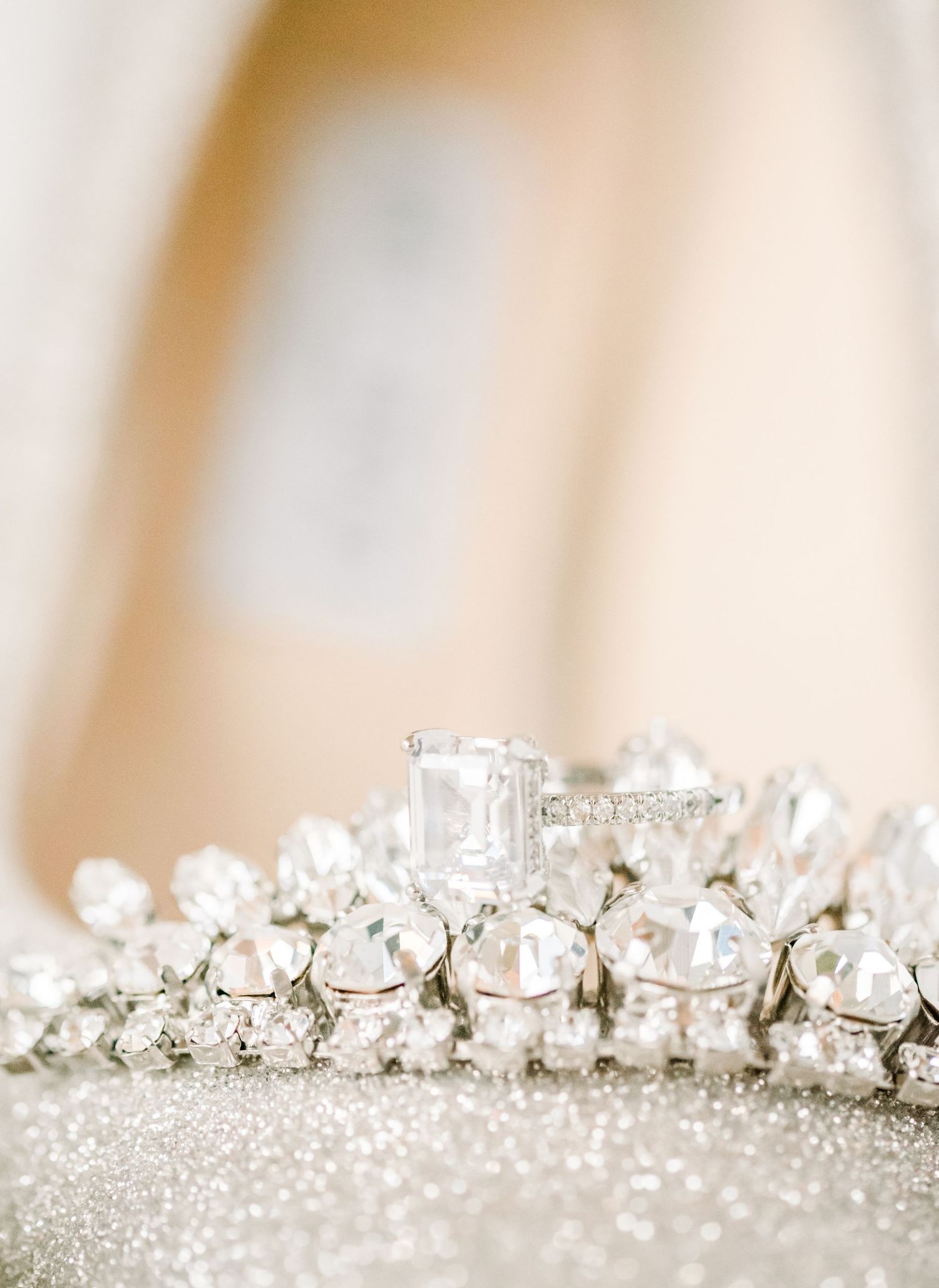 Crystal wedding tiara with intricate diamond detailing on soft background.
