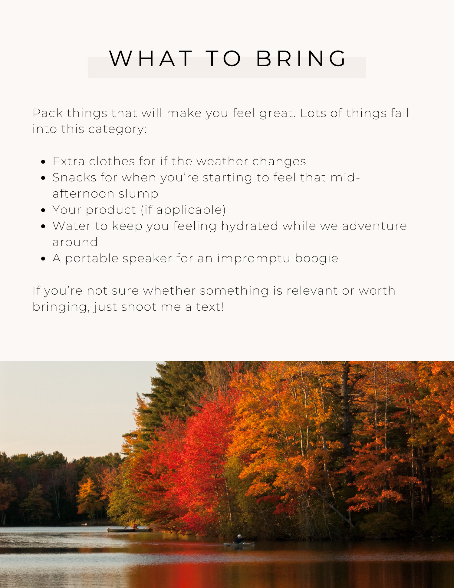 Scenic autumn landscape with vibrant red foliage reflecting on a calm lake during golden hour.