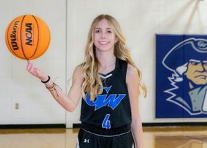 Team Sports Photograph of a basketball player for George Washington Middle School.