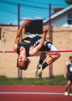 Photograph of Gunner Fertig High Jumping.