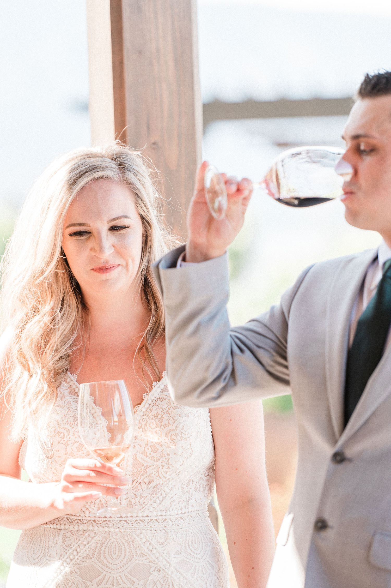 Bride and groom wine tasting