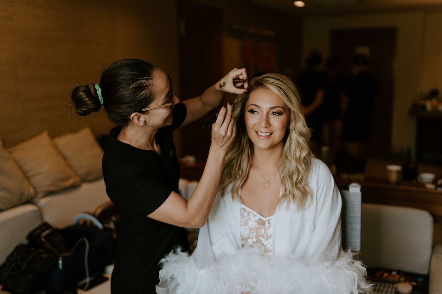 Capturing the anticipation and beauty of the bride's preparation in the tranquil ambiance of Dreams Las Mareas, a perfec