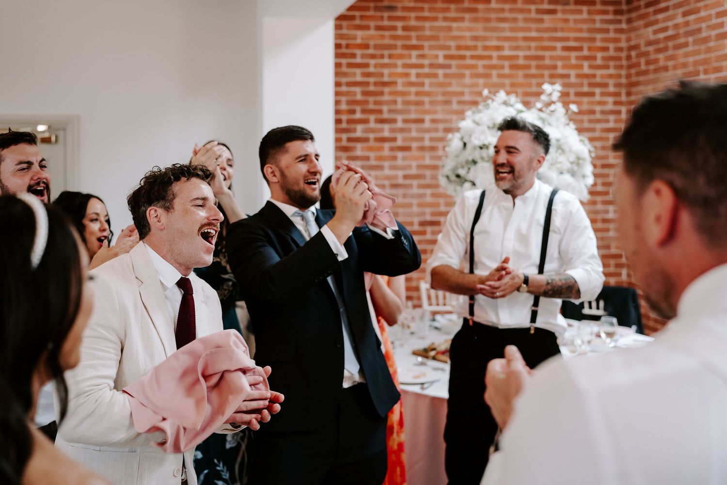wedding-guests-laughing-stockton-house-wedding-shropshire