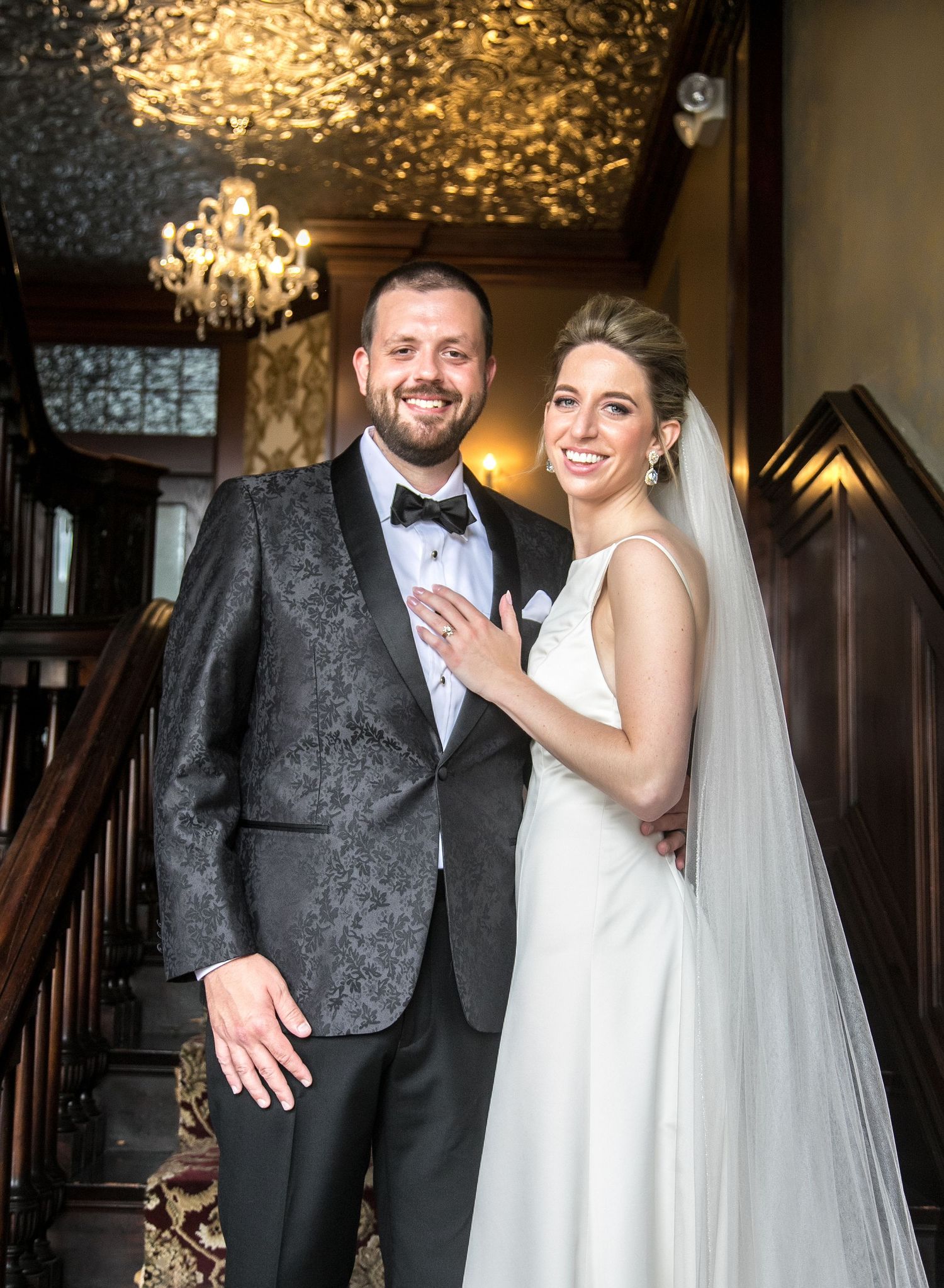 Elegant bride and groom posing for formal portrait, Semple Mansion Minneapolis, MN wedding photography