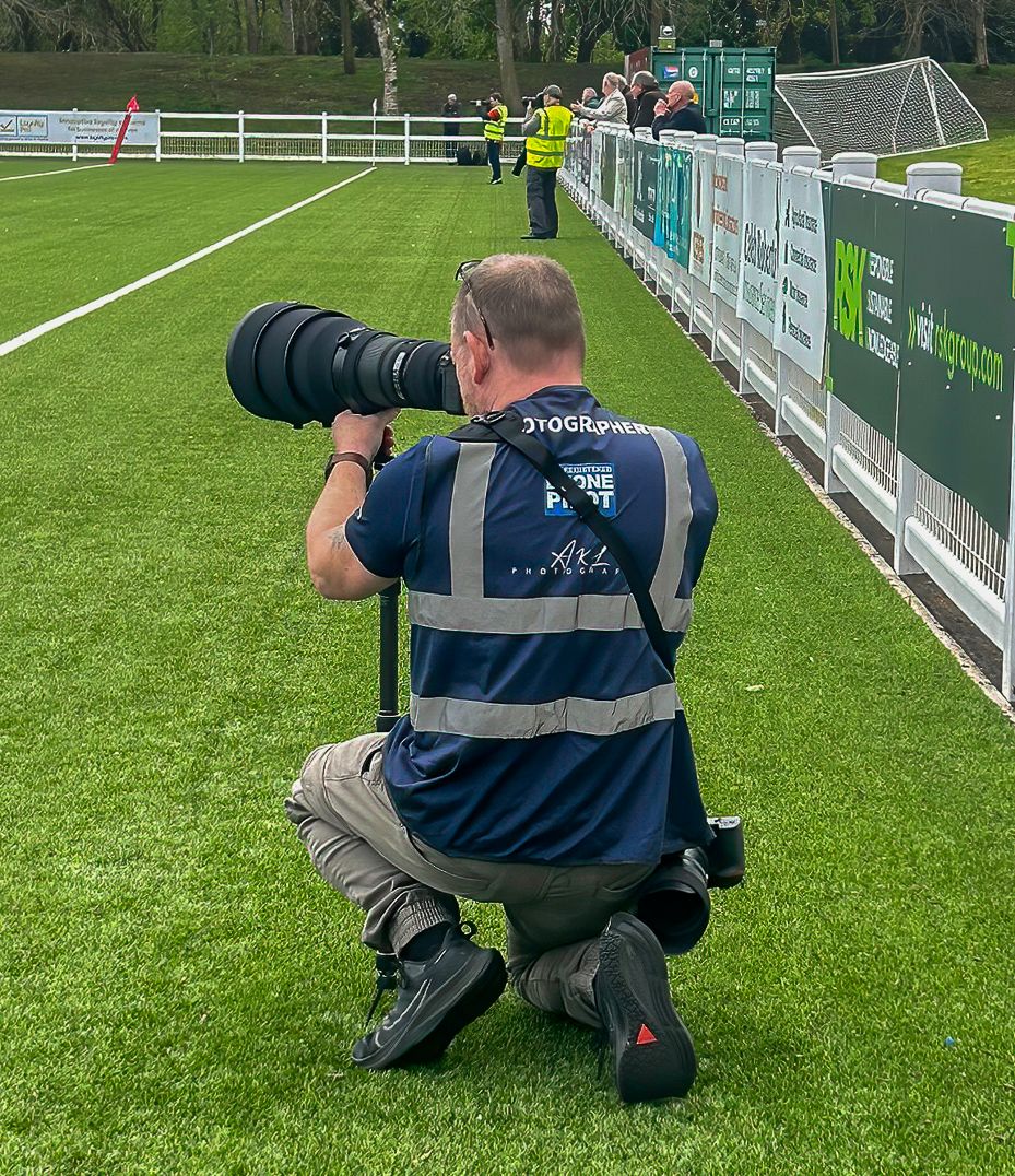 Al photographing Rugby Game