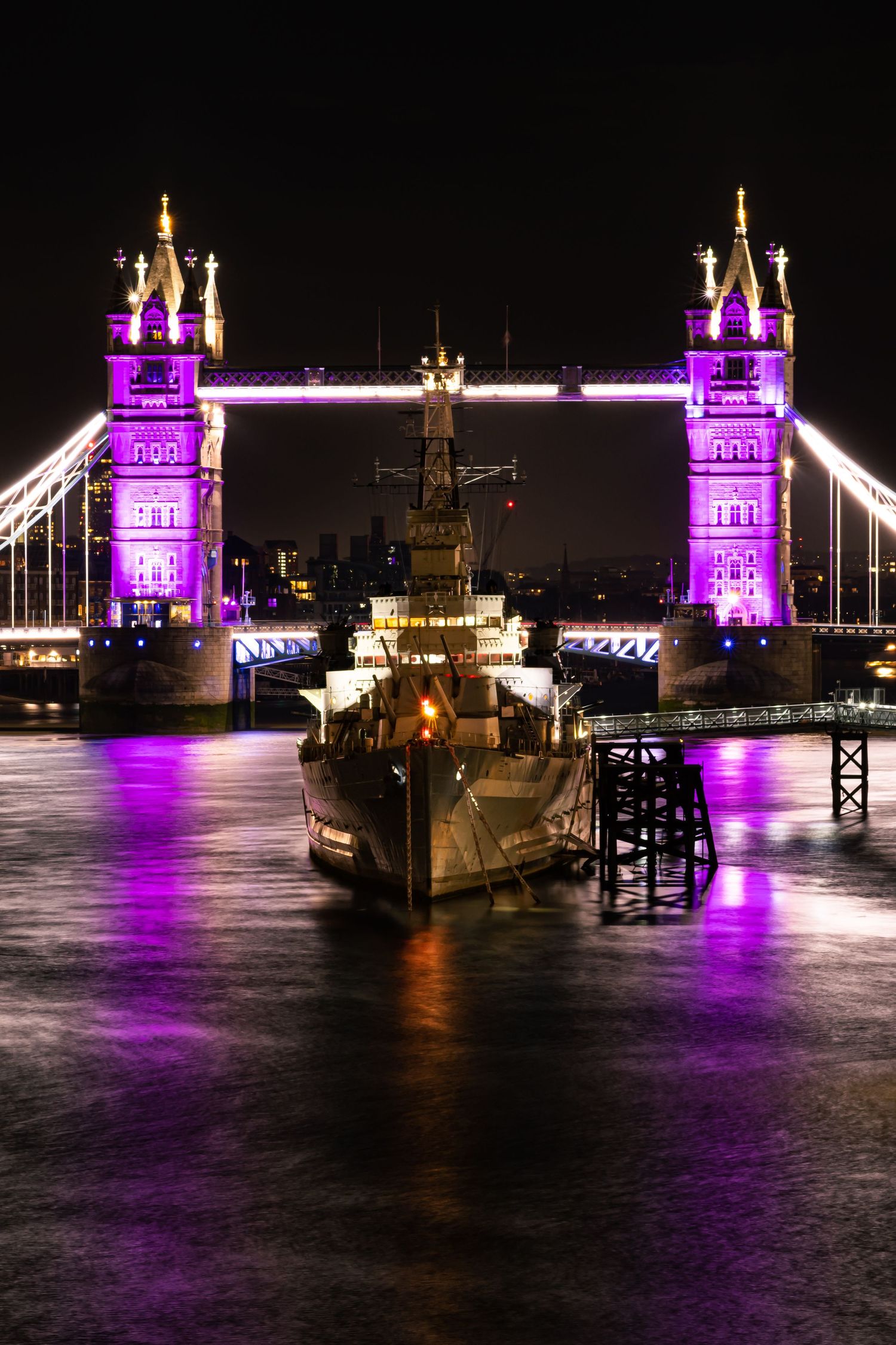 Tower Bridge lit up for Her Majesty Queen Elizabeth II Platinum Jubilee purple River Thames by Kush Rattan Photography