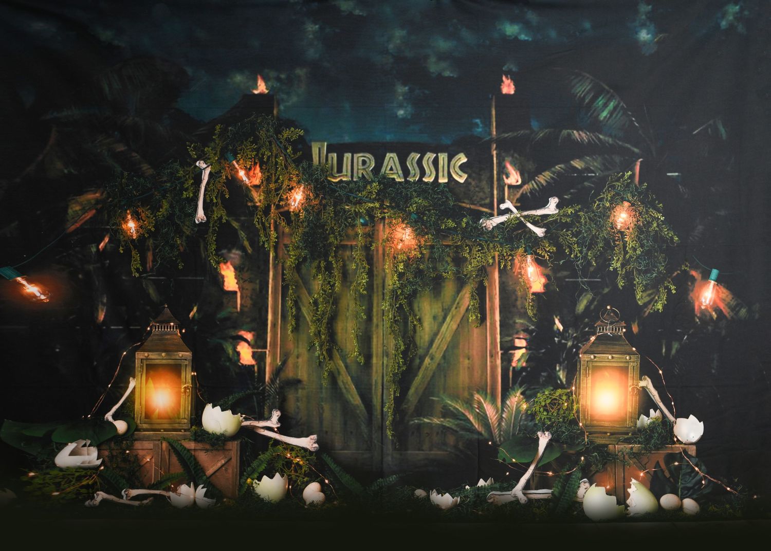 Atmospheric Jurassic-themed scene with glowing lanterns and prehistoric decorations.