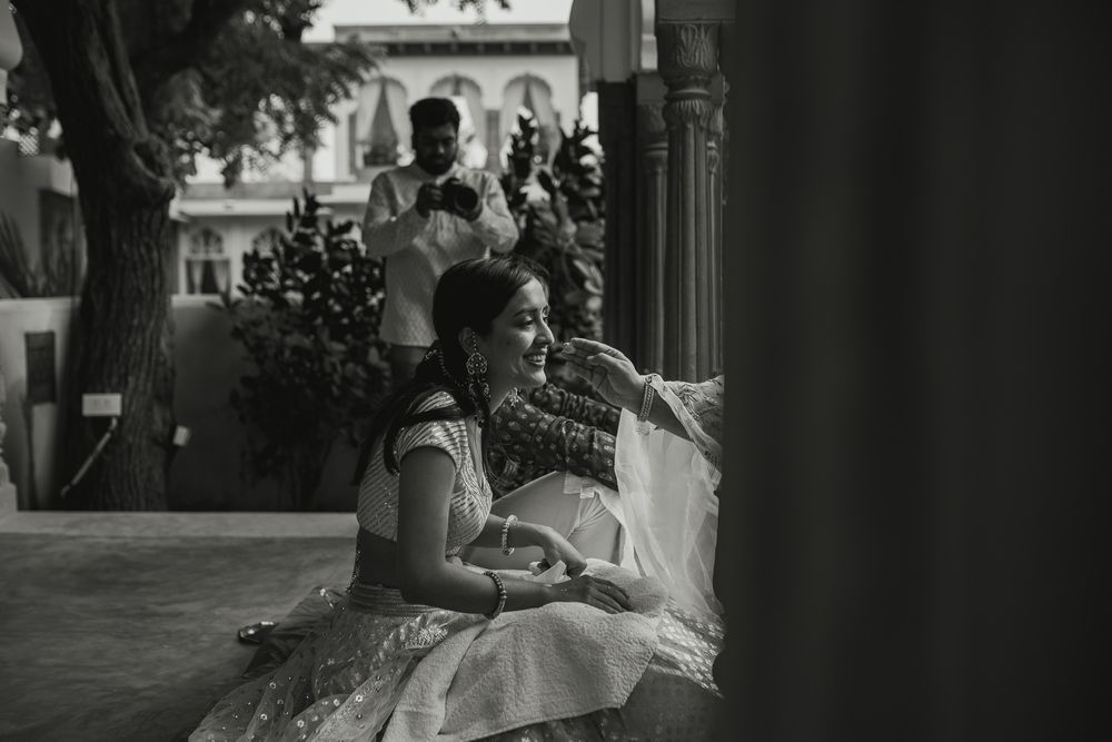 A minimalistic photograph of haldi being applied