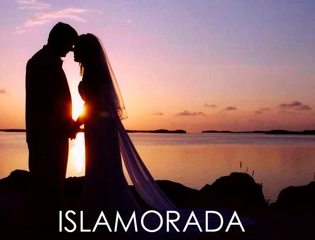 A romantic sunset silhouette of a couple on the beach in Islamorada.