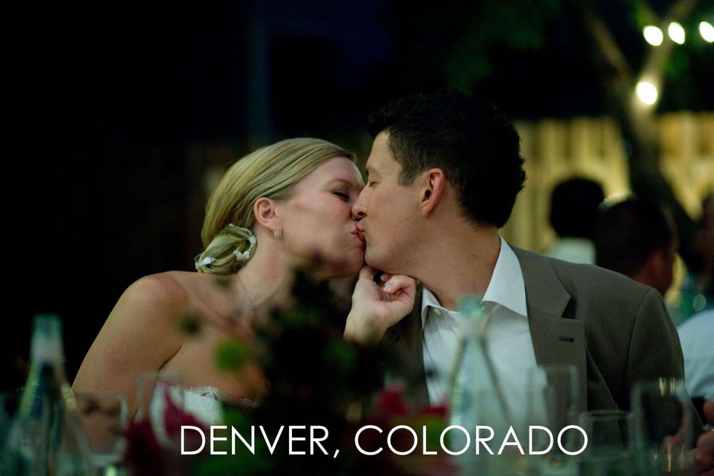 Romantic candlelit outdoor reception moment in Denver, Colorado.