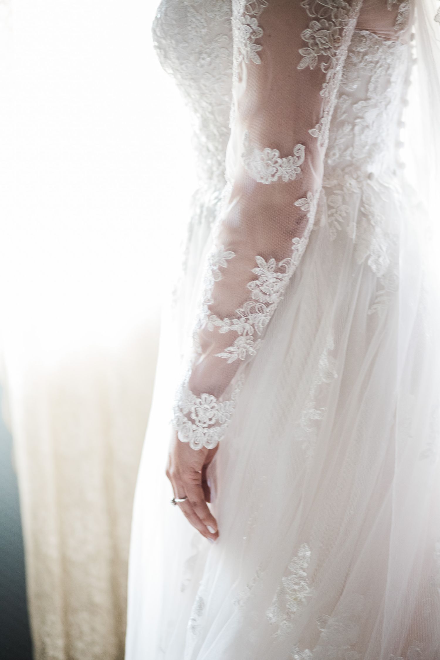 Closeup of bride's dress details by Hudson Valley photographer