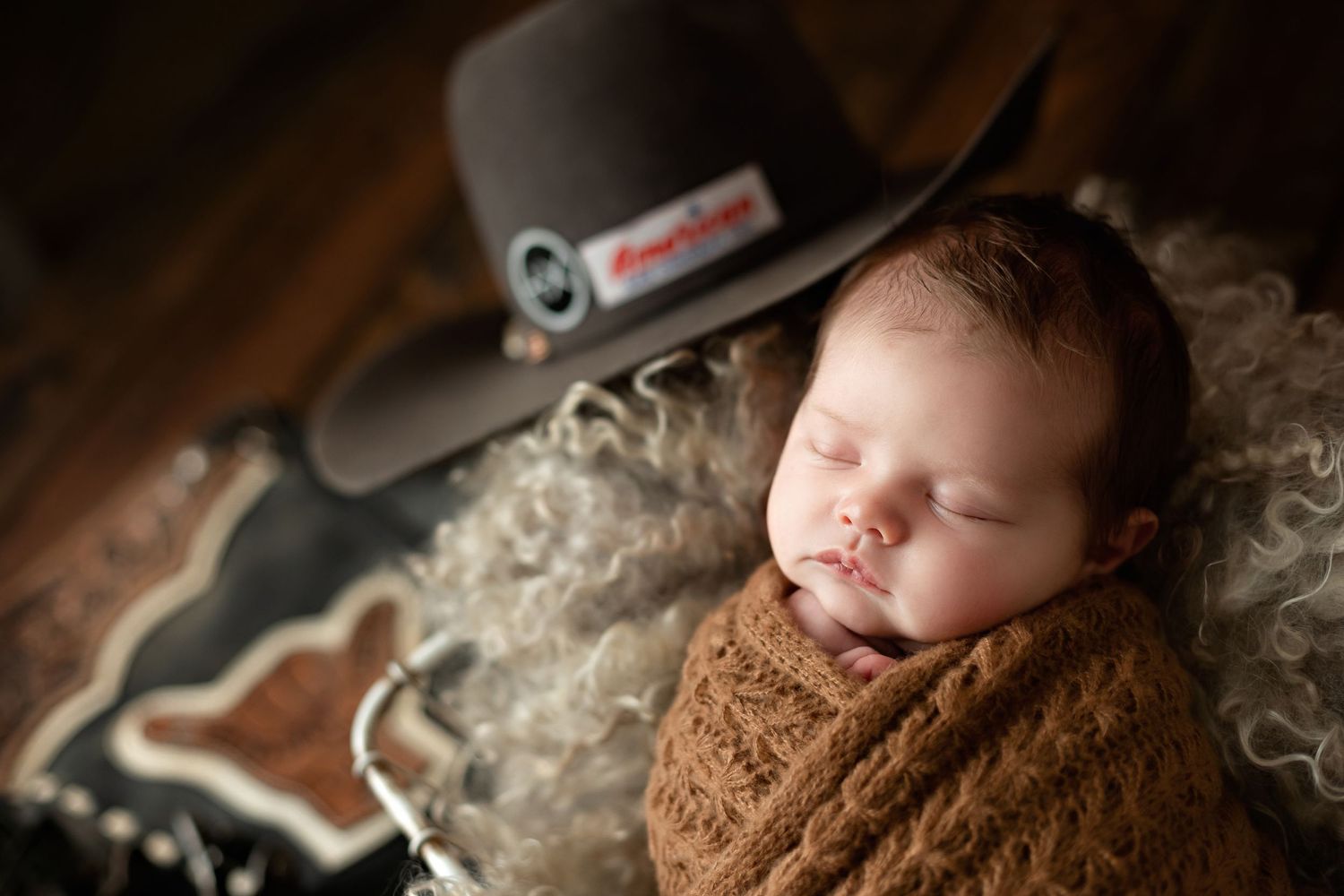 A newborn session with a cowboy hat. Greenville SC newborn photographer, Easley, SC newborn photographer, Upstate SC newborn