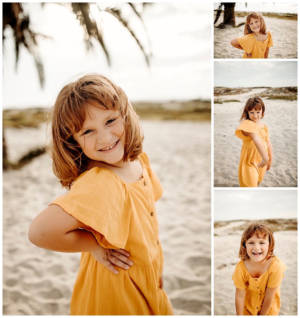 young girl laughs and looks over shoulder during Coronado mini session