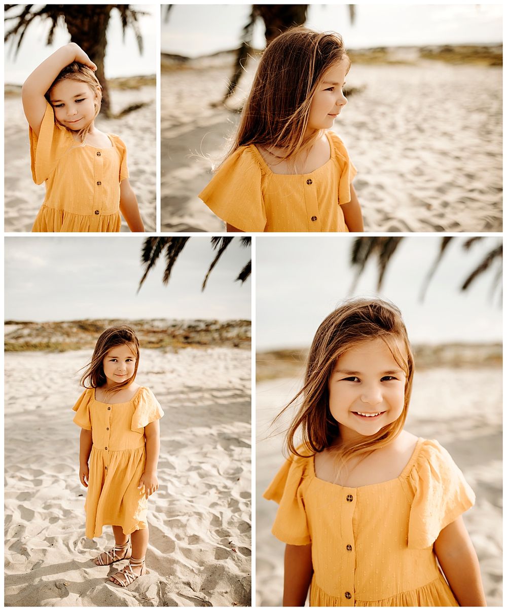 girl brushes hair out of face by San Diego photographer