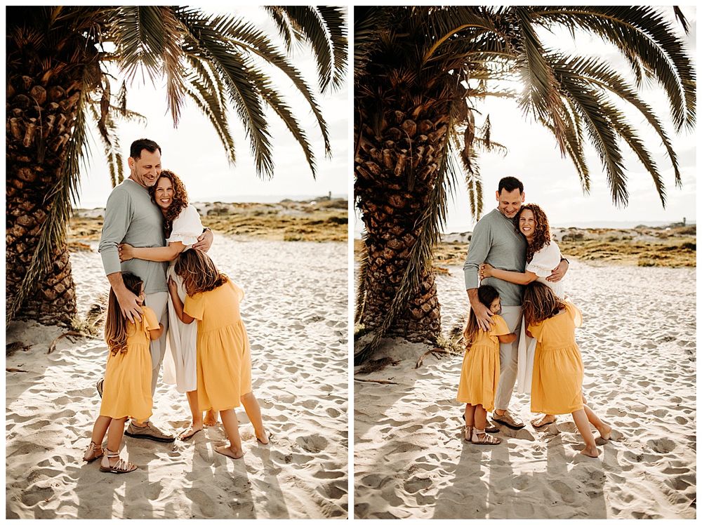 family gathers in a hug by San Diego photographer