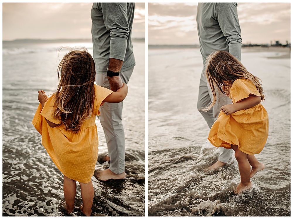 child holds up dress from waves by Danielle Miranda Photography