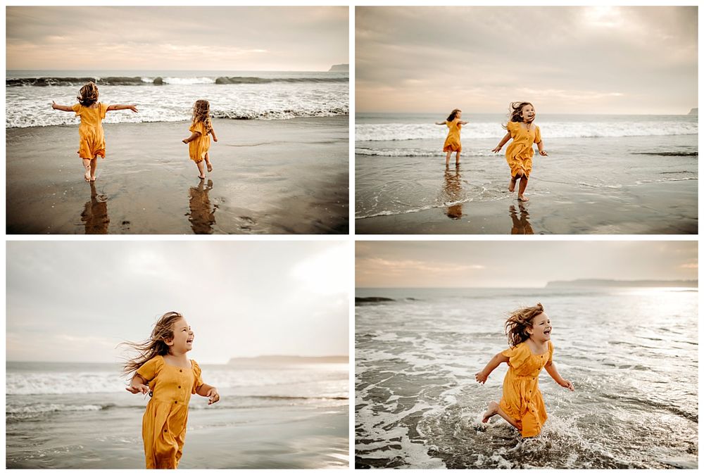 girls laugh and run through waves by Danielle Miranda Photography