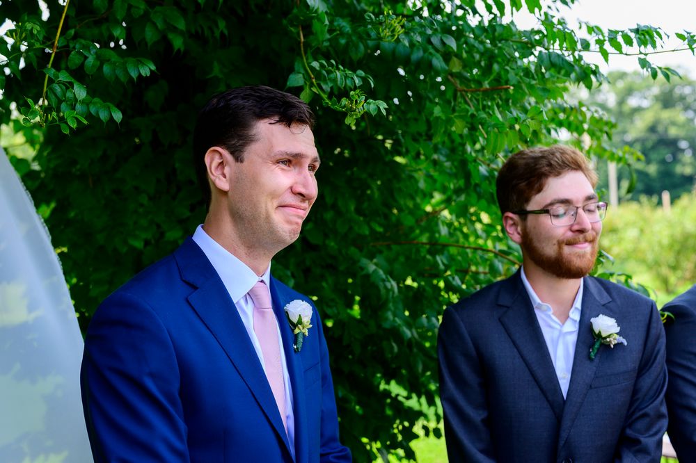 London Wedding Photographer Arrowwwod Groom Reaction to Bride Walking Into Ceremony Spirits Intrigued Photography 2022