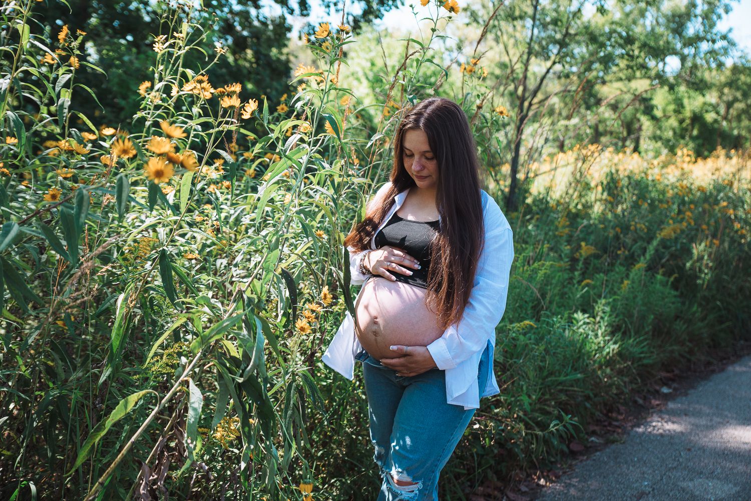 outdoor maternity photoshoot with flowers in Schaumburg, IL maternity photographer in Bartlett, IL