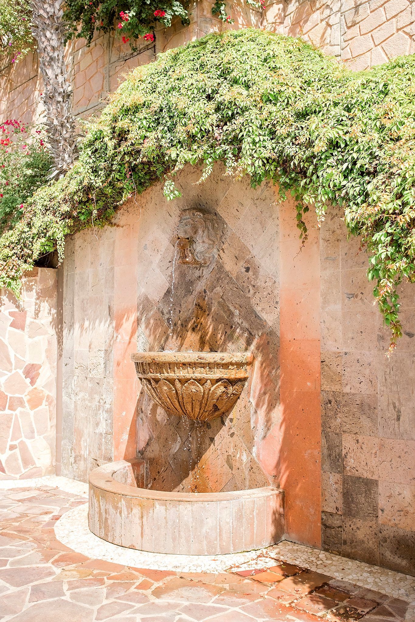Another lion’s head stone fountain.