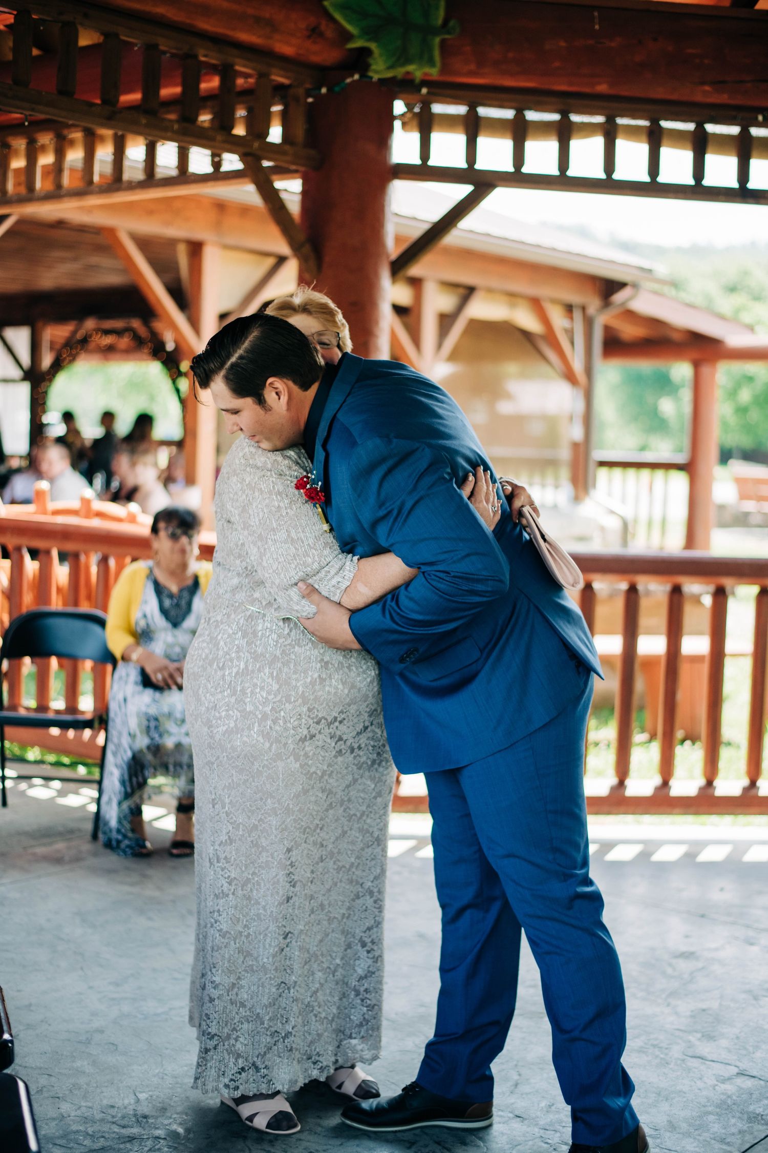groom hugging his mother