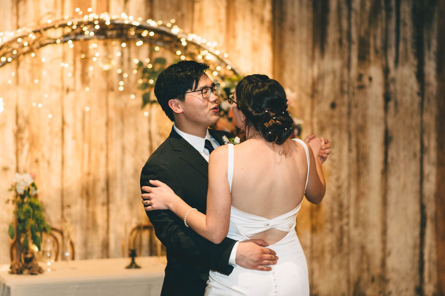 bride and groom sharing their first dance at the Barns at cooper molera in Monterey