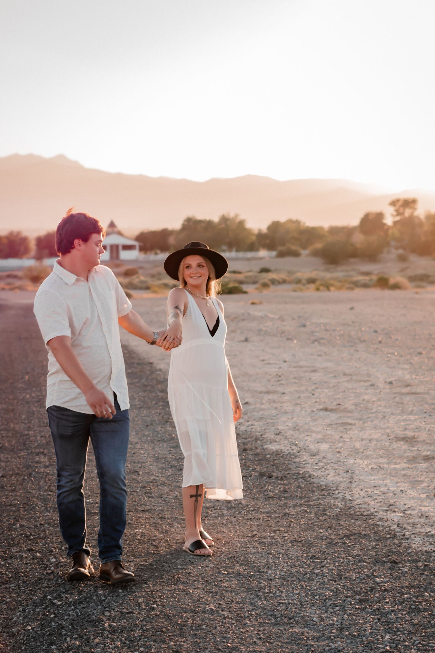 sunset couples photo walking together