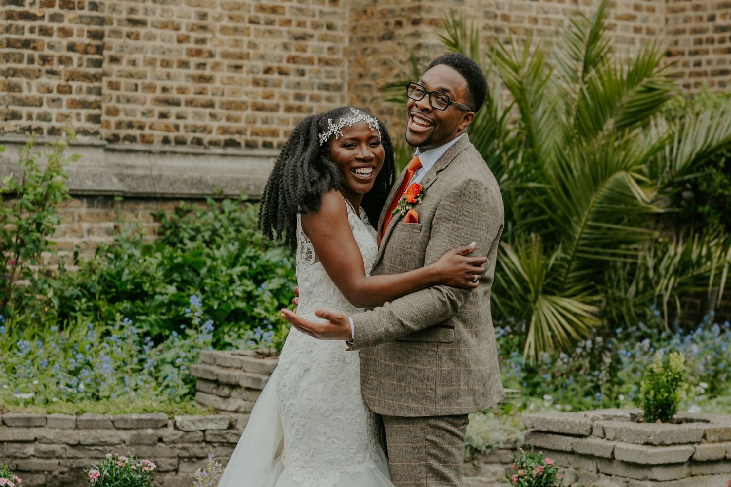 Bride and Groom laughing,  Elim Pentecostal Church Leytonstone Wedding London