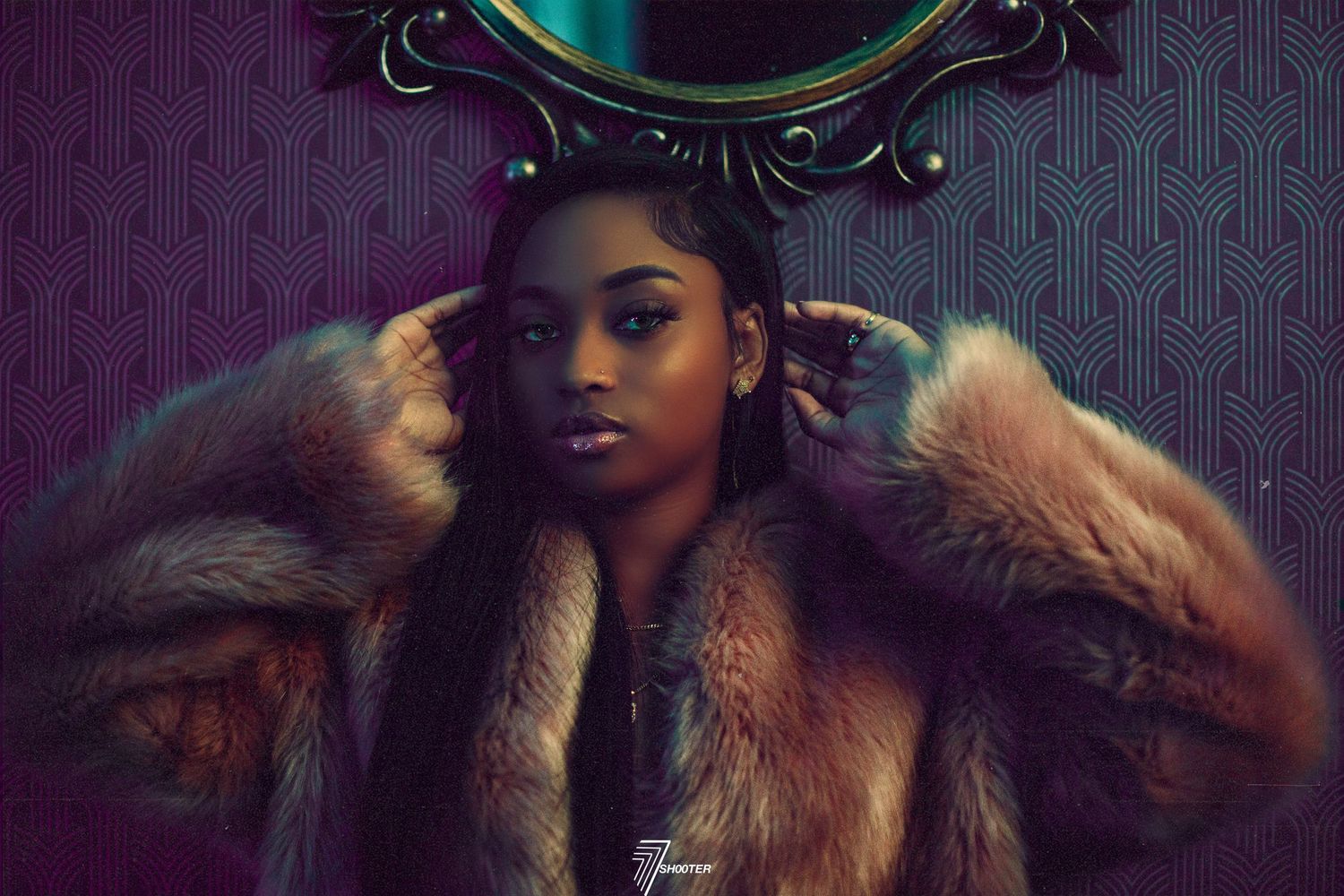 A figure in a luxurious fur coat poses against a moody purple background beneath an ornate frame.