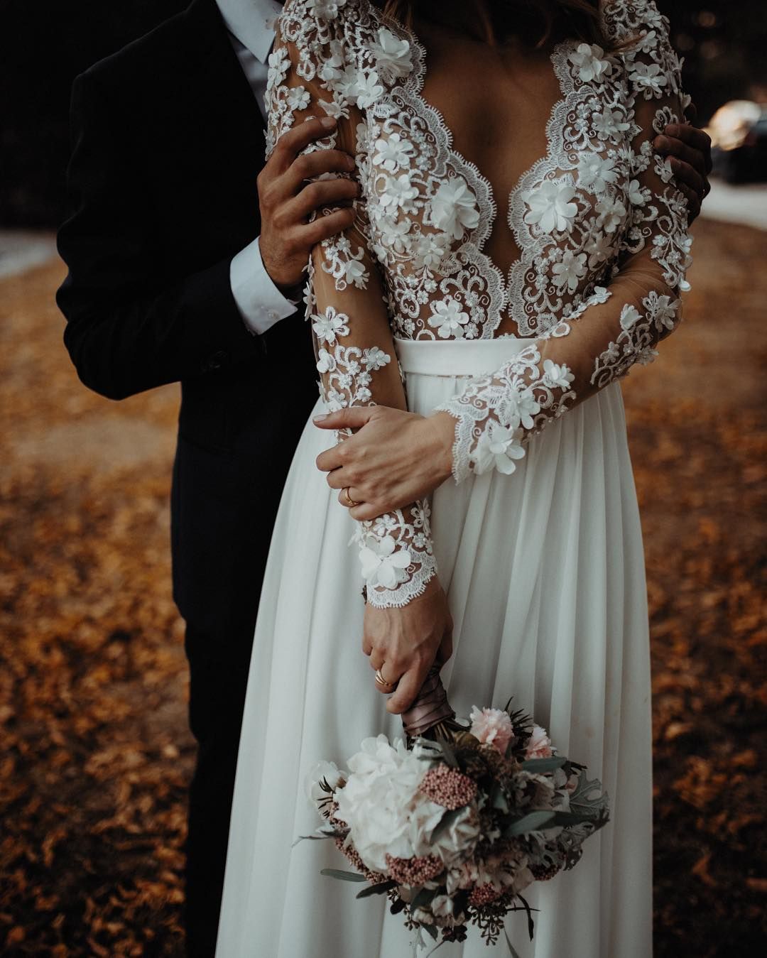 Lace dress and bouquet detail on wedding day in Split, Croatia.