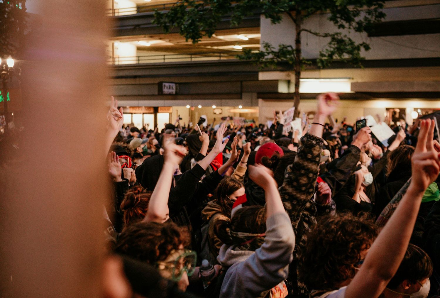 protesters raise their fists at BLM protests Portland OR photojournalism