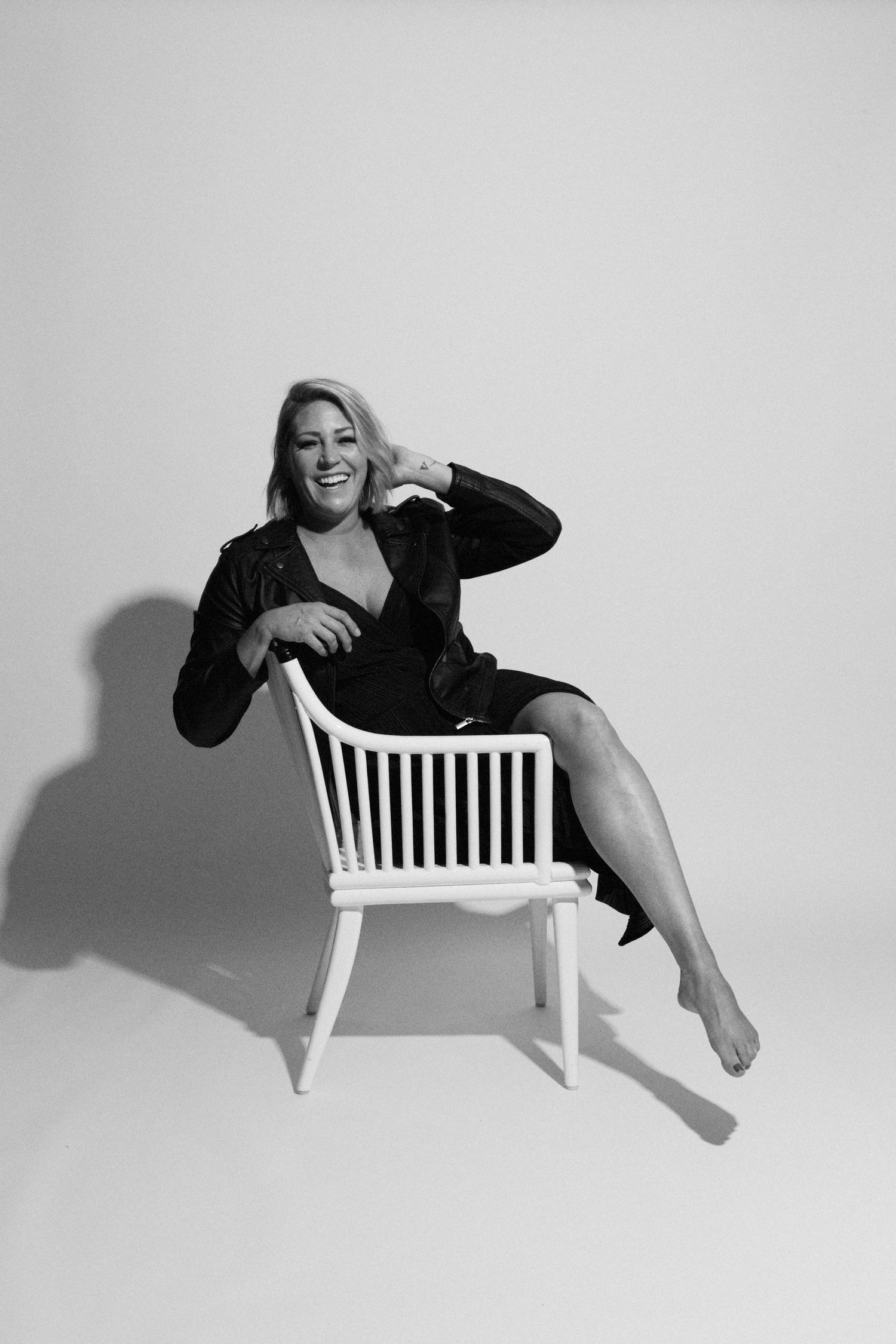 Series of artistic poses on a white bench against light background showing movement and form.