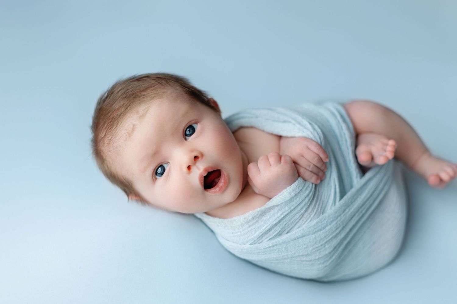 A newborn boy with his mouth open. Greenville SC newborn photographer, Easley, SC newborn photographer, Upstate SC newborn