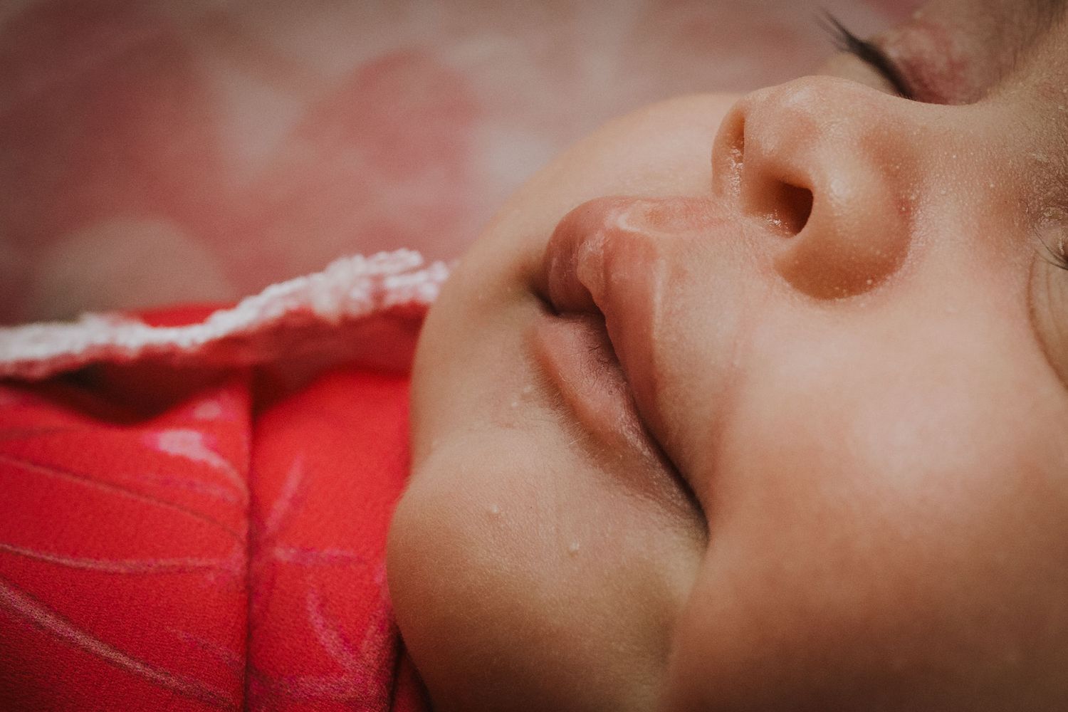 newborn baby girl lips macro detail lifestyle photo