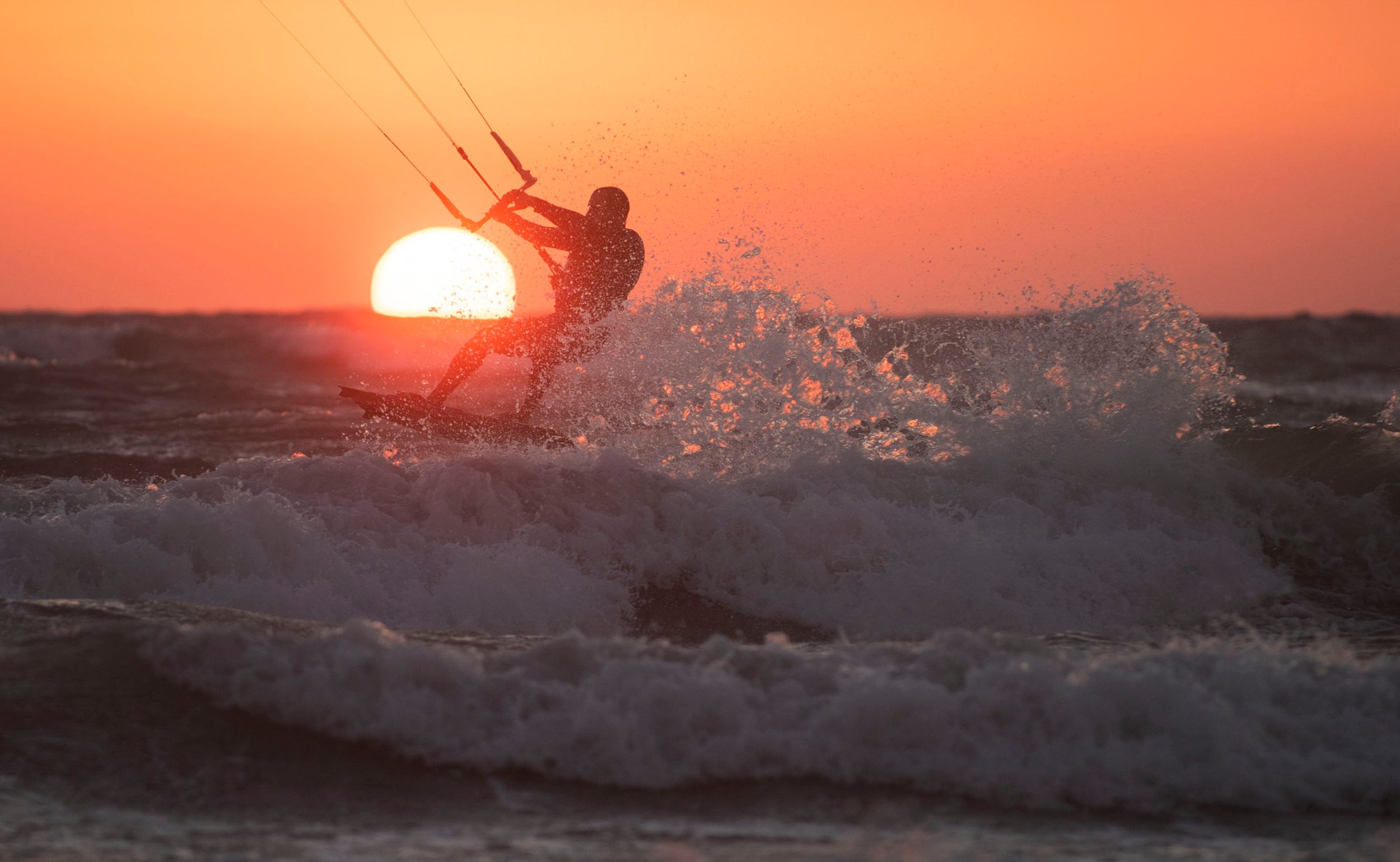 A sunset Kiteboarder in Limassol, Cyprus.