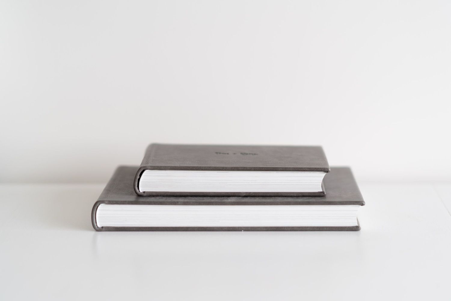 mini album sitting on top of larger memory album in colour boulder leather