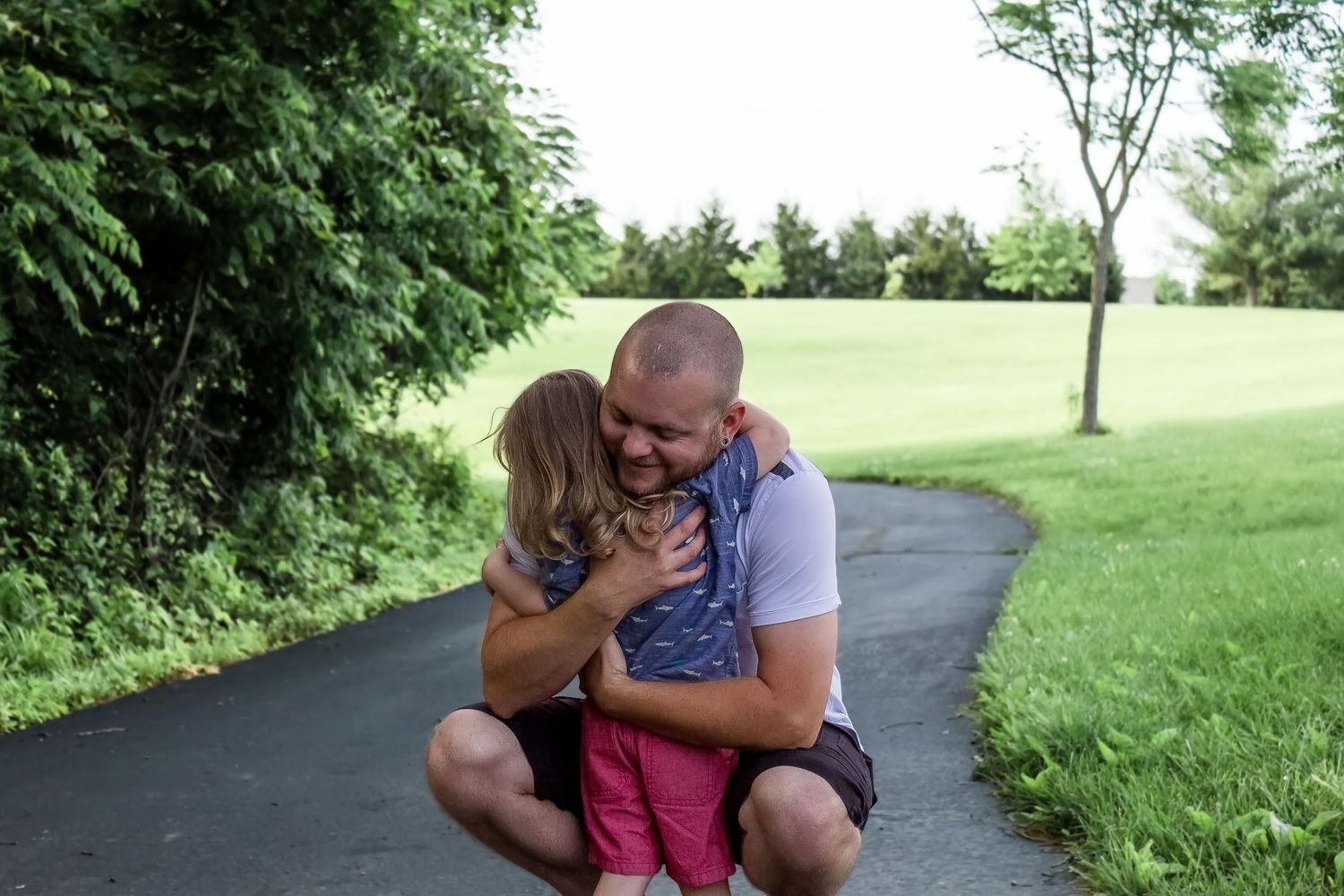 Dad and son Father's Day family pictures Quail Ridge Park St. Louis Give It A Shot Photography